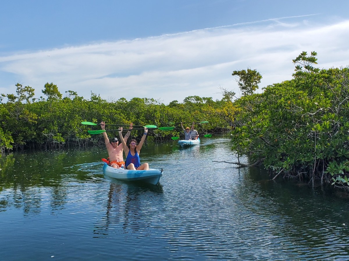 a small boat in a body of water