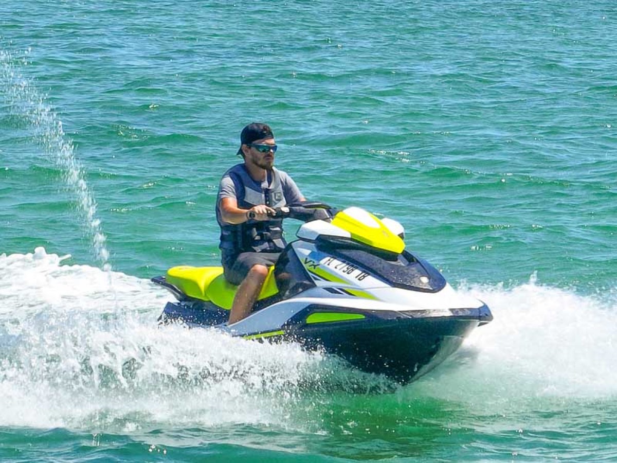 a man riding a surfboard in the water